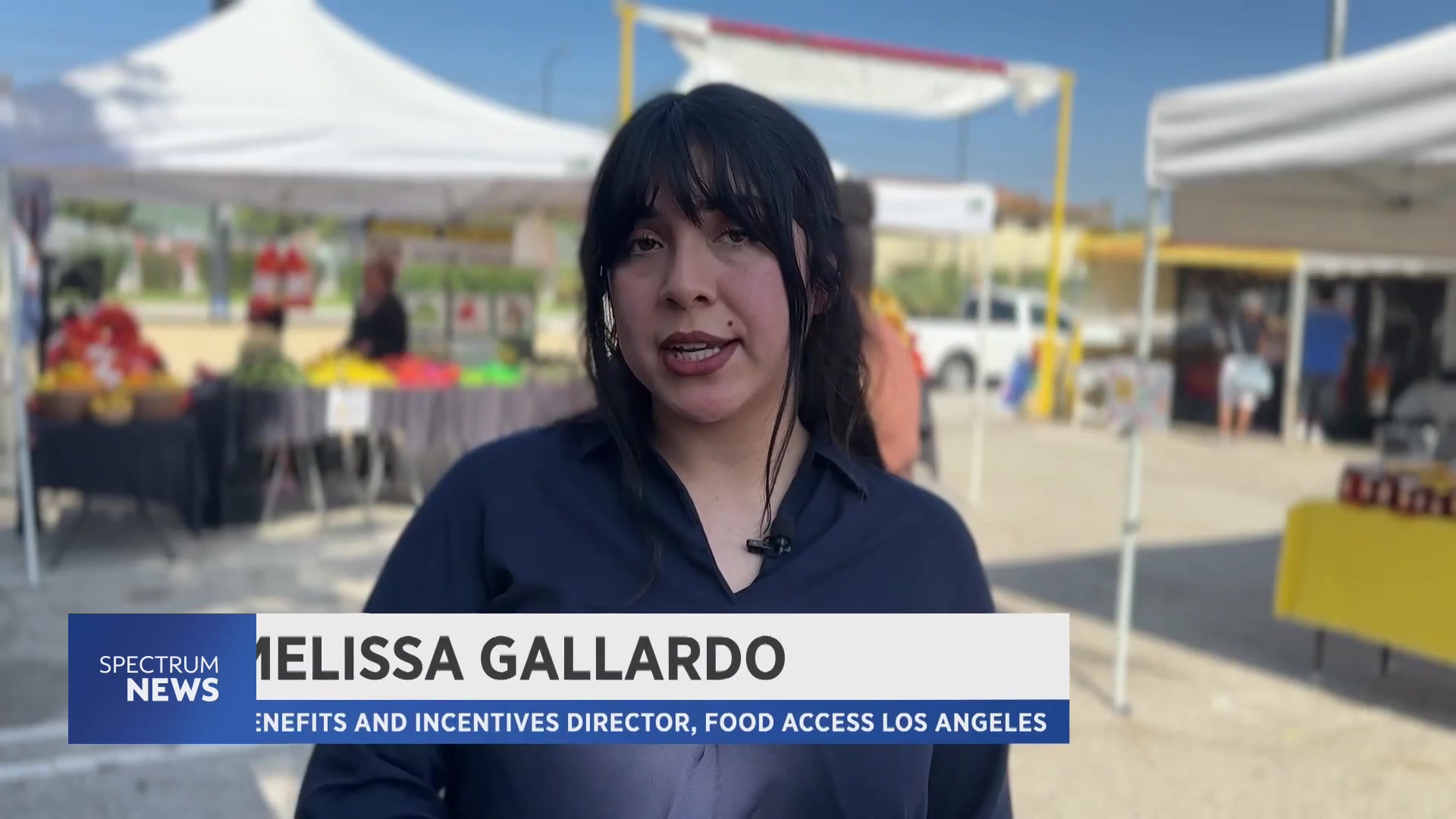 Melissa Gallardo speaking in Vania Patino-Hernandez's Spectrum News field report